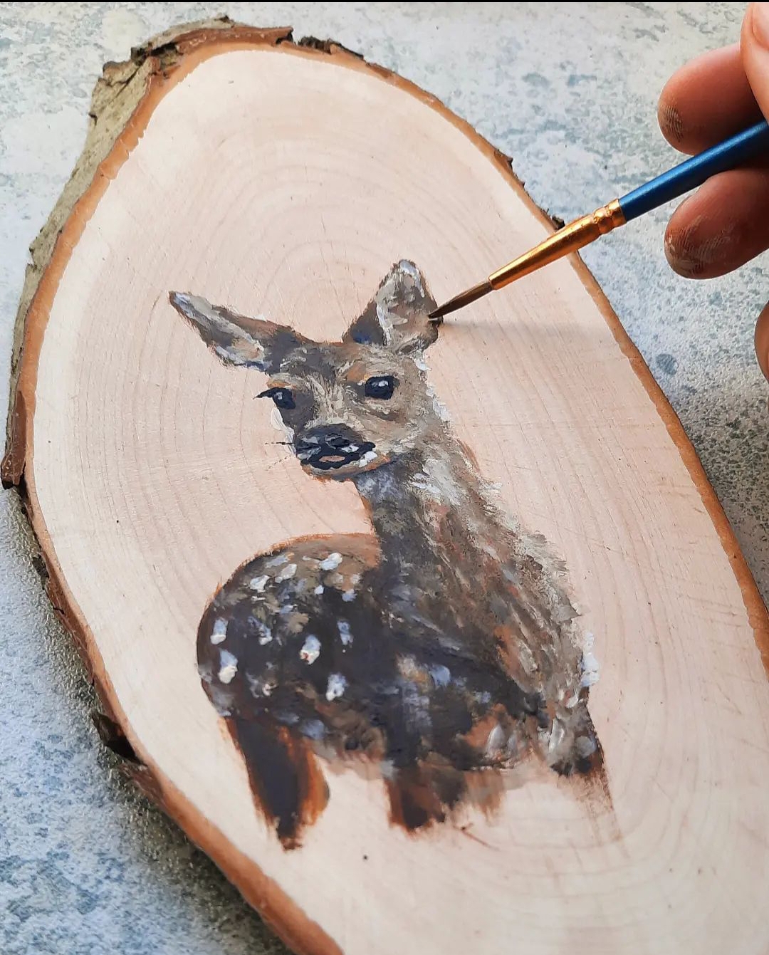 Foto van Workshop Dier op boomschijf schilderen